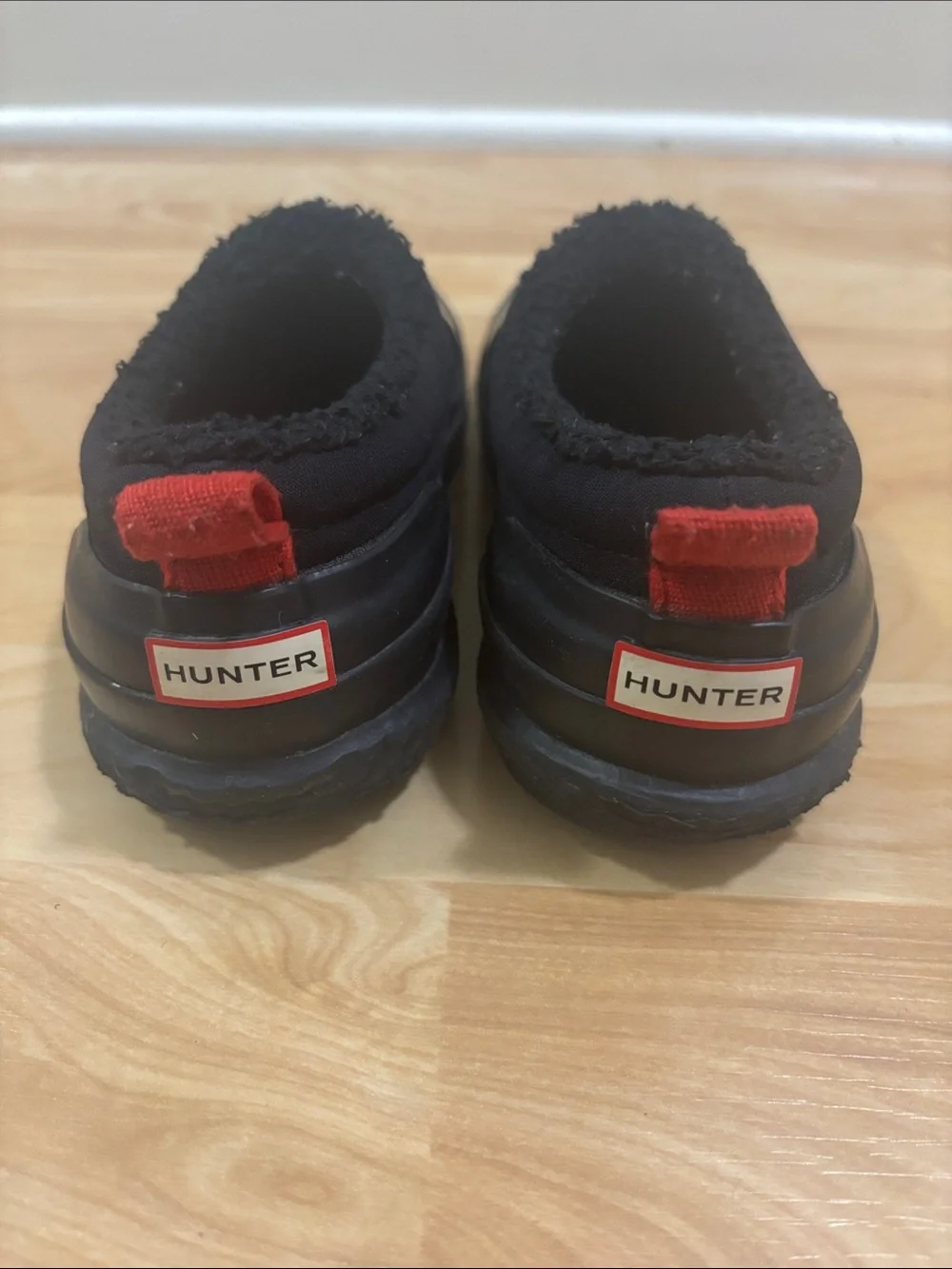 Hunter Kids Black Slip-On Rain Boots with Red Pull Tabs